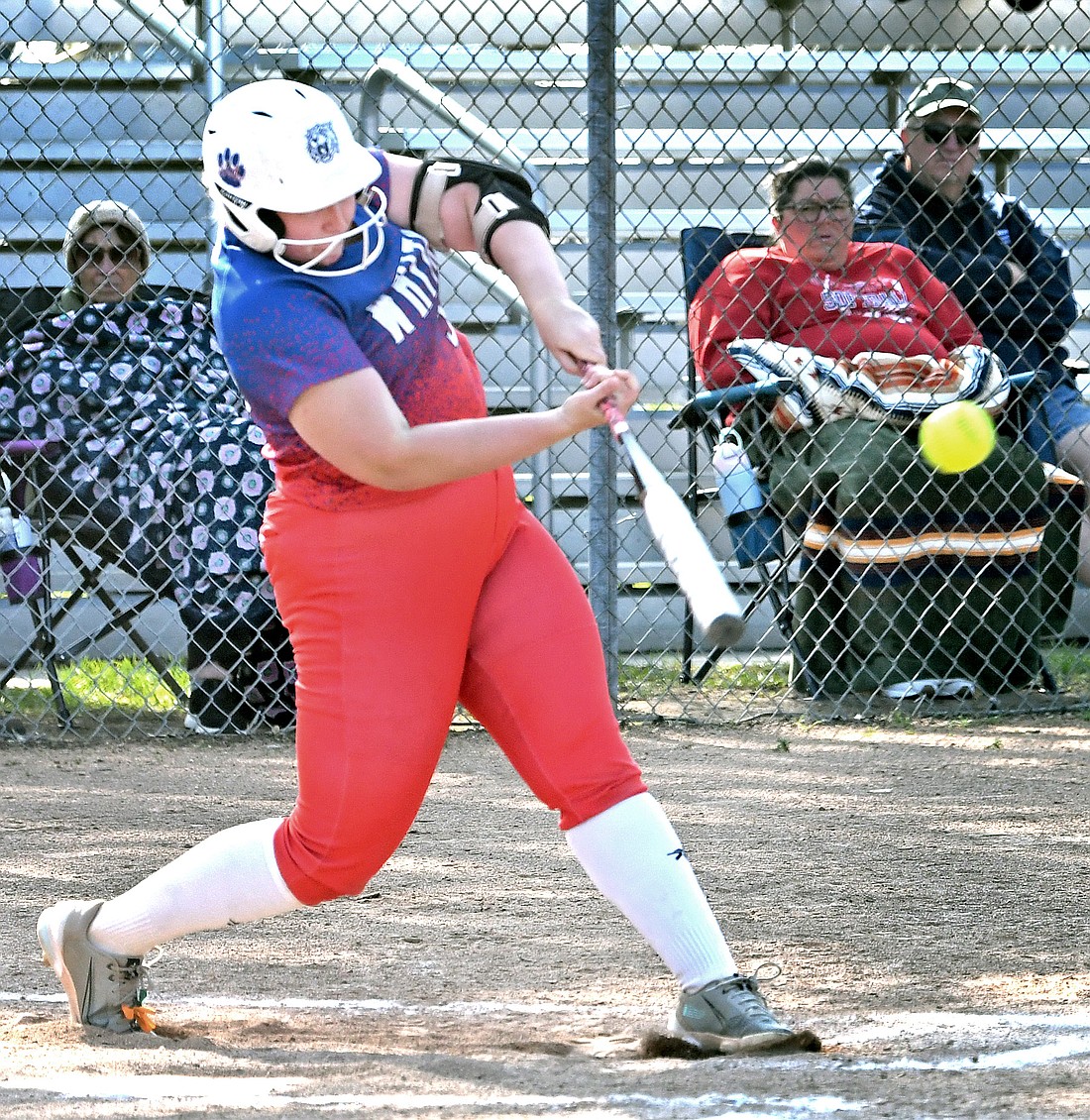 Senior Addie Garr of Whitko powers through the ball for a triple in the first inning...NIeter