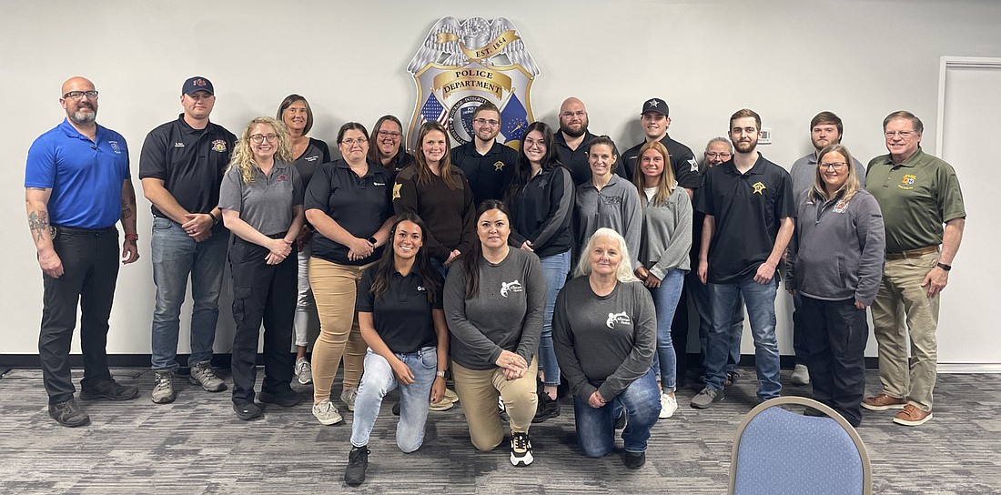 The third cohort of Crisis Intervention Team graduates are pictured, along with the trainers. Photo Provided