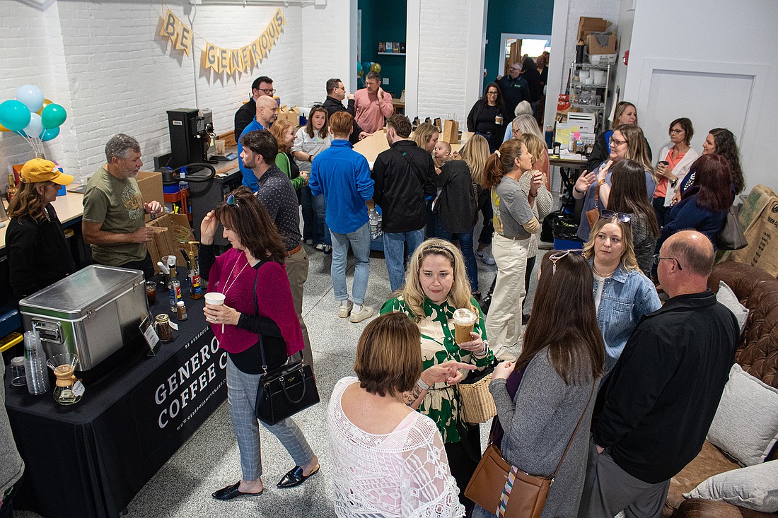 Community members gather at Generous Coffee for its one-year anniversary celebration. Photo Provided