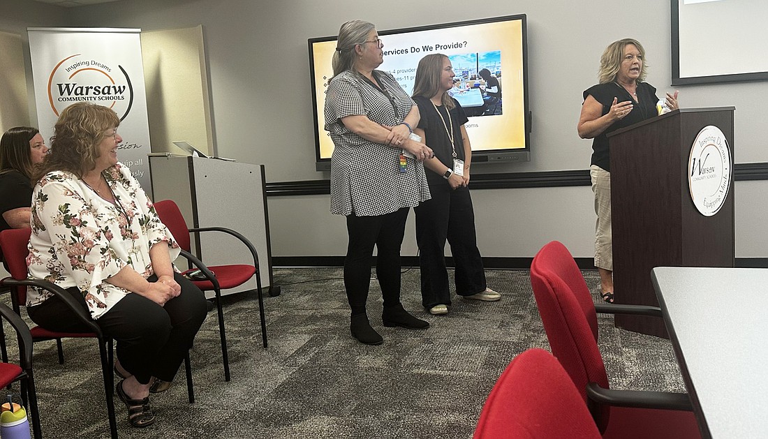Speaking to the Warsaw School Board Monday night are (L to R) Tina Northern (sitting), Warsaw Community Schools assistant director for special services; and preschool special education teachers Trish Price, Baylie Plank and Stacey Ousley. Photo by David Slone, Times-Union
