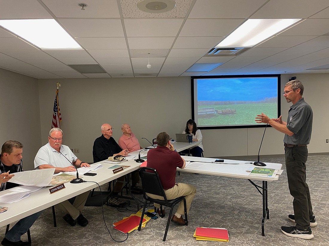 Quaker Haven Camp Executive Director Brandon Dennis (R) speaks before the Kosciusko County Board of Zoning Appeals at its meeting on Tuesday. Photo by Leah Sander, InkFreeNews