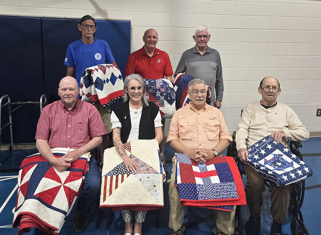 Pictured (L to R) are, front row: William Metz, Diana Price, Gary Sturdevant, Larry McCullough; back row: Mark Curry, Jerry Hogan and John Koltz. Photo by Jackie Gorski, Times-Union