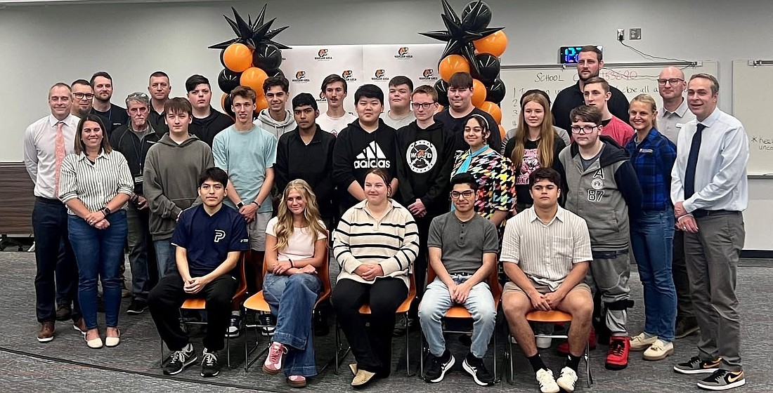 Pictured are the Warsaw Area Career Center students who signed for RAMP Wednesday, along with WACC staff and administration and RAMP community and business partners. Photo Provided