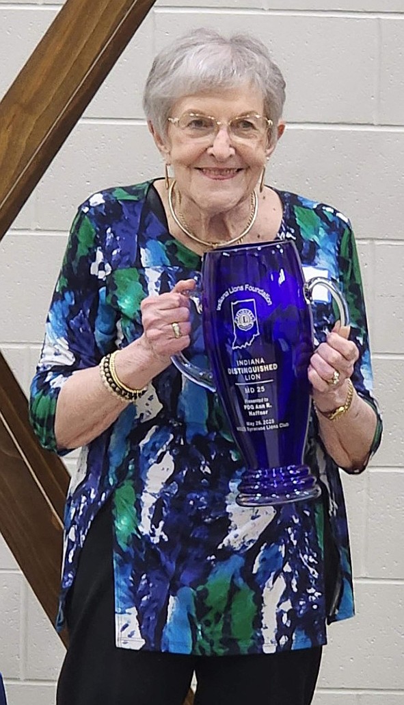 Ann Haffner holds her Indiana Distinguished Lion Service Award. Photo by Deb Patterson, InkFreeNews