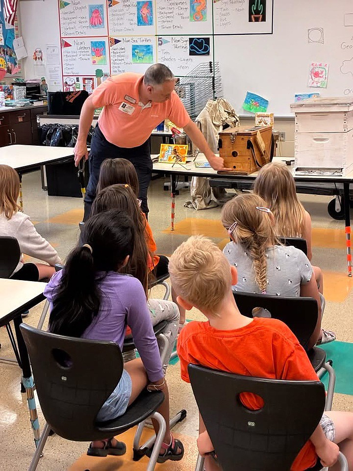 Jeremy Corson talks to Claypool Elementary School students about beekeeping and ecosystems. Photo Provided