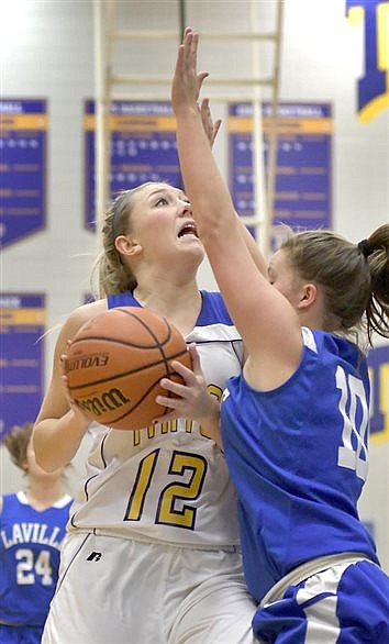 Lady Trojans Top LaVille In Conference Opener