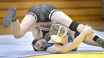 Manchester Topples Triton On Wrestling Mat