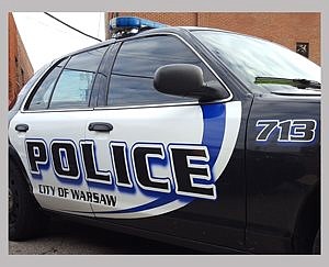 Warsaw Man Allegedly Drags Woman theft of car