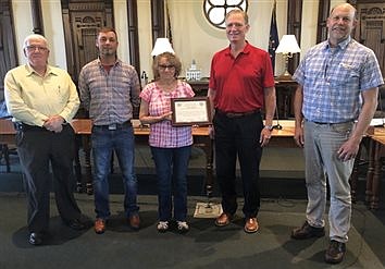 Commissioners Recognize Sandoval For 34 Years Of Service To KABS, Cardinal Services