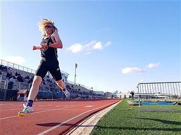 Tigers Claw Cavemen In NLC Track Opener