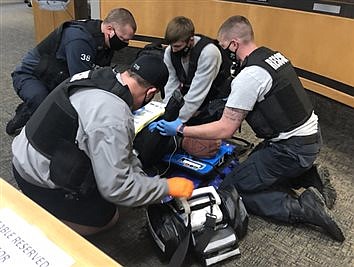 Firefighters/EMTs Demonstrate Autopulse Device