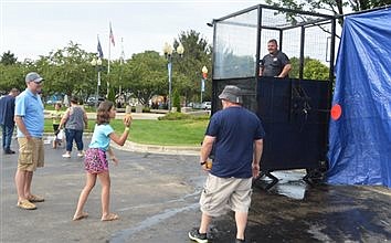 Kids Enjoy A Variety Of Games At Family Carnival