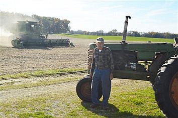 Neighbors Help Farmer With Harvesting After Wife Dies