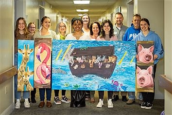 Grace Art Students Present Paintings To Retirement Community