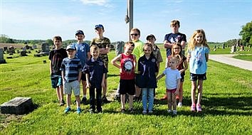 Scouts Place Flags At Veterans’ Graves