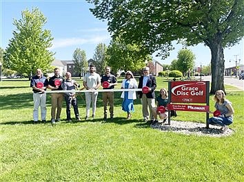 Grace Holds Ribbon Cutting For New Disc Golf Course Signs, Tee Pads 